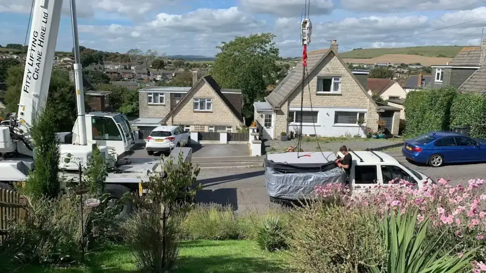 Hot tub being professionally moved