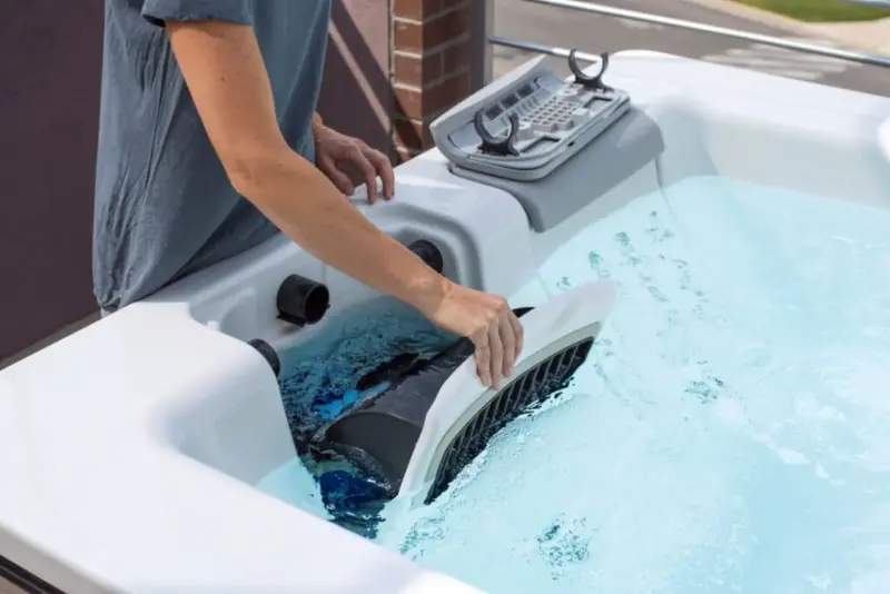 Checking hot tub filter and jets