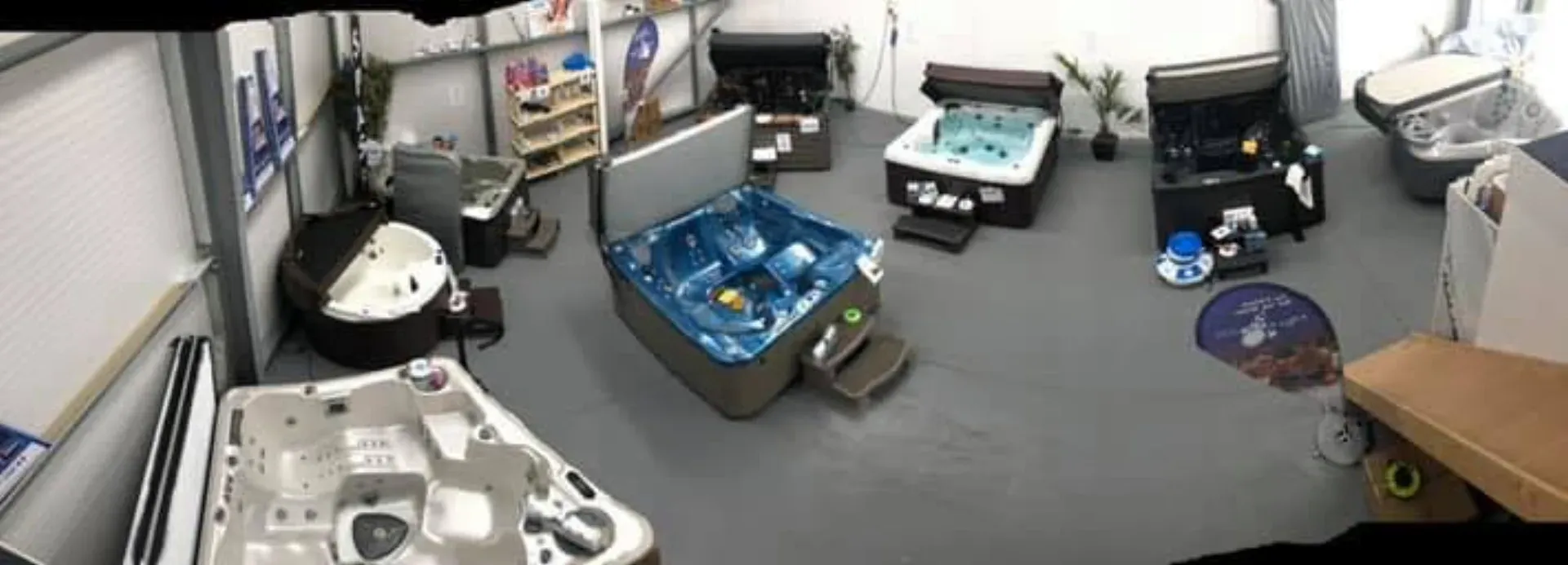 Peterborough Hot Tubs showroom with multiple hot tubs on display